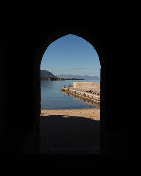 Cefalu, Italy; 1st January 2026: Porta Pescara, one of the city's ancient medieval gates, offering a picturesque view of the sea.