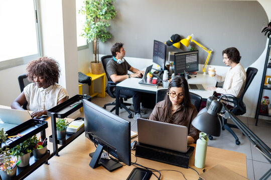 Diverse startup team working in a modern office