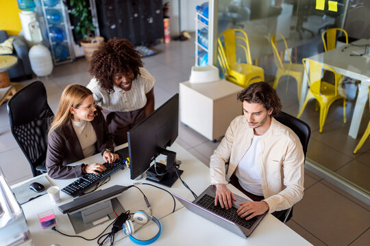 Diverse business team collaborating in modern office space