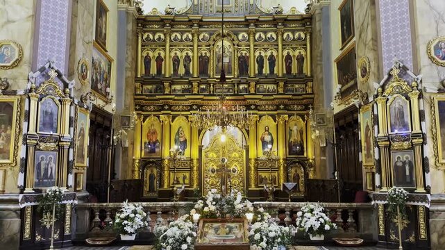 Interior view of a beautiful church showcasing ornate architecture, high ceilings and detailed decorations. Sacred space emphasizing the atmosphere of peace, spirituality and historical character