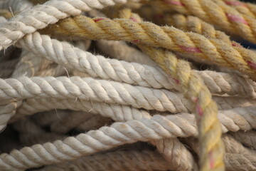 Fototapeta premium Macro close up shot of coiled textured marine rope details with nautical