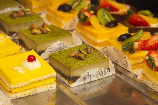 Pistachio Cake. Assortment of traditional Sicilian pastries with marzipan and candied fruit.