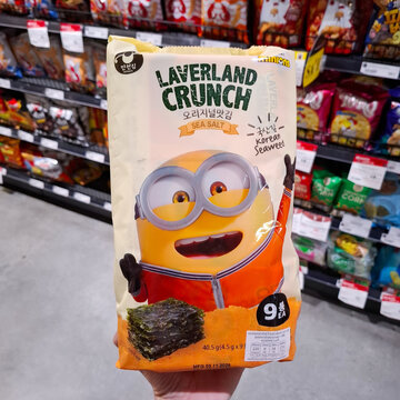 Laverland crunch korean roasted seaweed sea salt snack bag with minions character packaging inside retail storeon May 23, 2026 in Bagnkok, Thailand