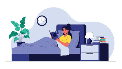 Obraz premium Young woman reading an interesting book in bed before falling asleep in a cozy dark bedroom during night time.