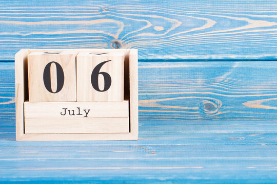 July 6th. Date of 6 July on wooden cube calendar