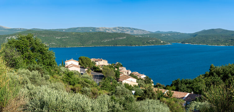 Sainte-Croix-du-Verdon, France - 07 05 2026: Panoramic view of Sainte-Croix-du-Verdon village, the Lake Sainte-Croix , hills and forest behind