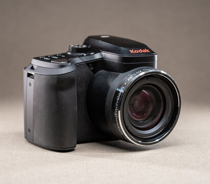 Gothenburg, Sweden - October 20 2023: Kodak bridge camera with extended zoom lens on display surface.