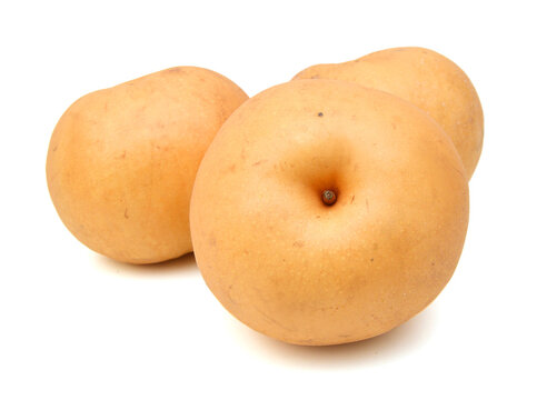 Yellow pears over white background