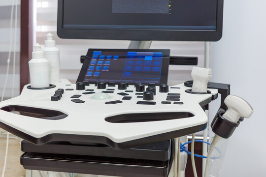 Modern Ultrasound Machine Control Panel with Monitor, Medical Imaging Equipment in Healthcare Clinic.