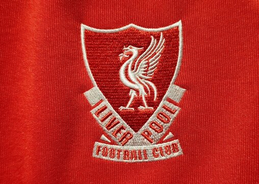 Photo of the embroidered Liverpool Football Club emblem, showcasing the club's iconic crest stitched in fine detail.
