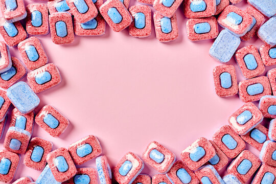Frame made of dishwasher detergent tablets with central copy space