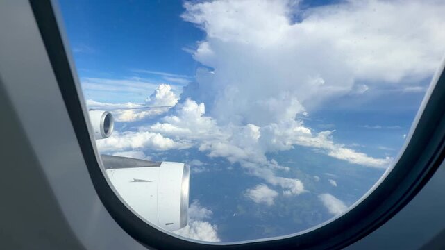 View from an Edelweiss Air Airbus A340 window during final approach to Tampa International Airport, Florida. The aircraft descends over the inland area of Tampa.