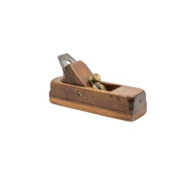 Old fashioned wooden hand plane tool for carpentry and woodworking projects on a flat surface isolated on transparent background