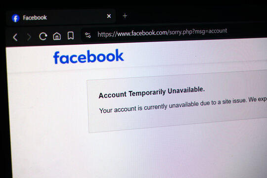 A desktop computer screen shows the Facebook error message &ldquo;Account Temporarily Unavailable. Your account is currently unavailable due to a site issue. 
