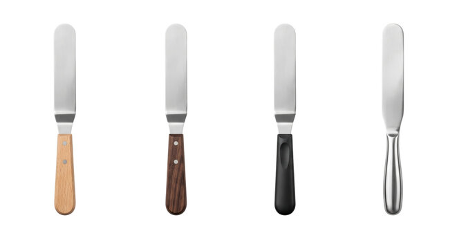 Set of spatulas and butter knives isolated