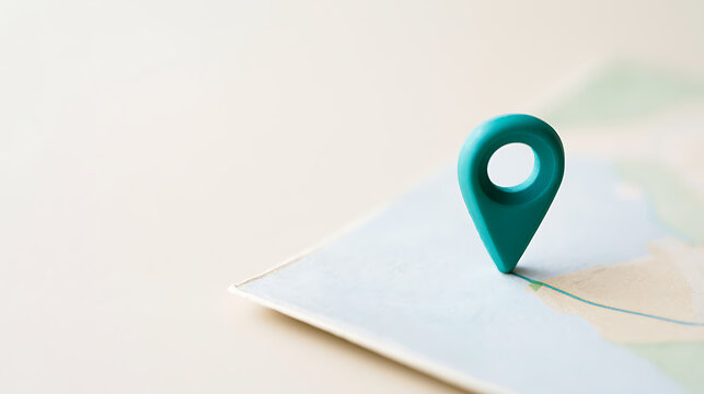 Vibrant Teal Location Pin Mark on a Softly Lit Map, Guiding a Path, Symbolizing Navigation, Travel, and Discovery with Copy Space
