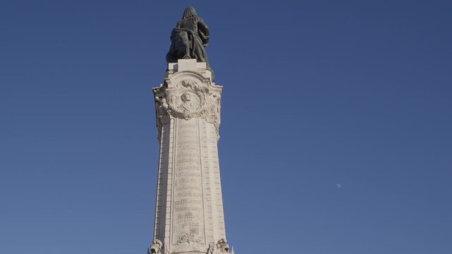 Looking Up at Marques de Pombal Monument Against Blue Sky in Lisbon Portugal During Summer Golden Hour Shot with Cinema Camera