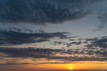 Fototapeta premium Beautiful summer sunset sky colorful clouds.