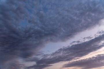 Fototapeta premium Beautiful summer sunset sky colorful clouds.