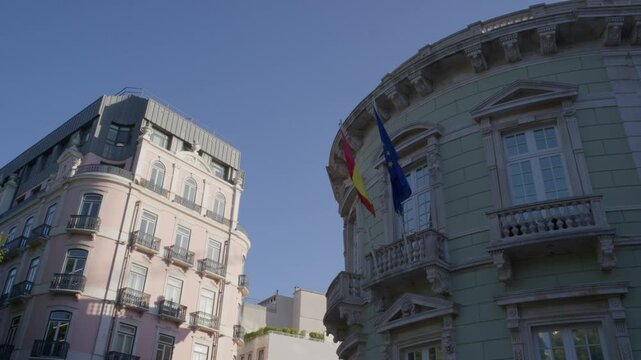 Historic Building with Spanish and European Union Flags in Lisbon Portugal During Summer Golden Hour Shot with Cinema Camera