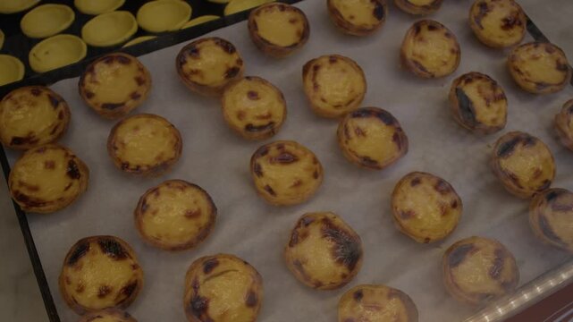 Fresh Portuguese Pasteis de Nata in Lisbon Portugal During Summer Shot with Cinema Camera
