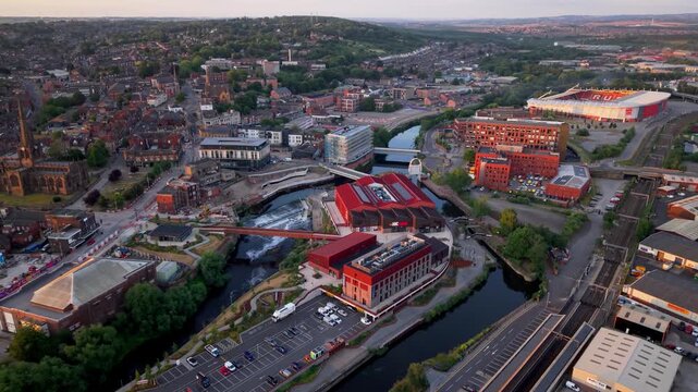 Aerial view of Rotherham town centre in South Yorkshire, UK at sunset with high street shopping and vibrant community along the River Rother and Forge Island