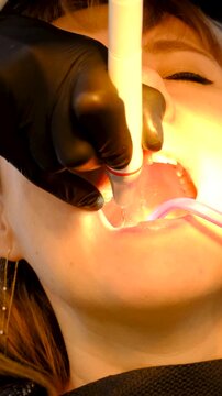 Woman at the dentist office. Selective focus. copy space.