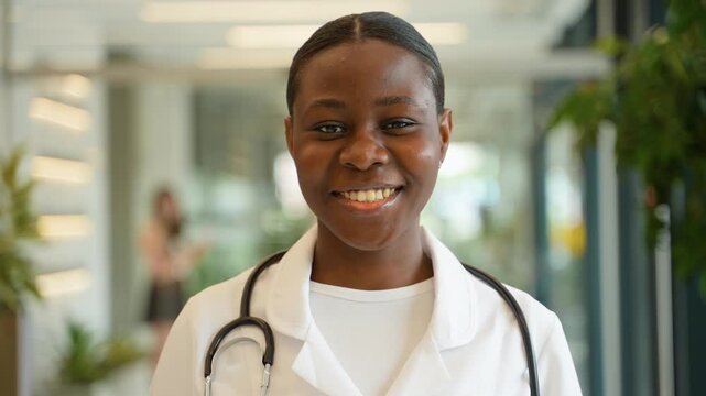 African american female doctor intern smiling at camera