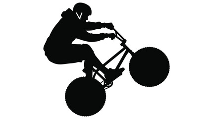 Fototapeta premium A bold black silhouette of a cyclist performing a stunt on a rugged mountain bike