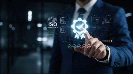 Fototapeta premium Businessman selecting a quality assurance certification icon on a virtual screen for ISO standards.