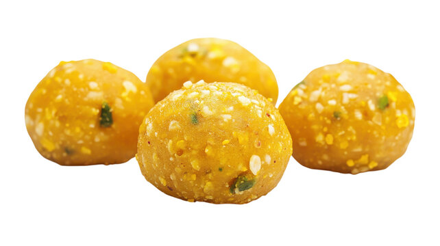 Group of round yellow indian sweet laddus isolated on transparent background for food web.