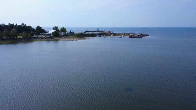 Drone Perspective of Port of Trois-Pistoles Marina with Calm Waters in Quebec