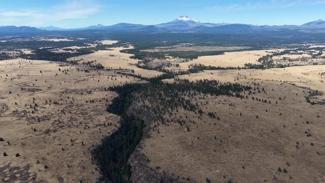 Over millennia Mill Creek has carved a 230-foot deep canyon on the Central Oregon plateau between Bend and Portland. This rugged yet scenic area of high desert is part of the Warm Springs reservation.