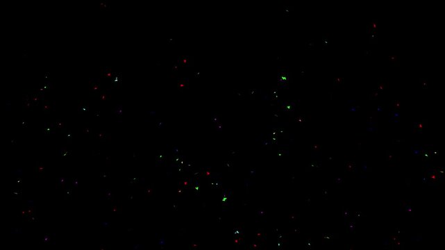 Colourful confetti party popper explosions on green backgrounds,