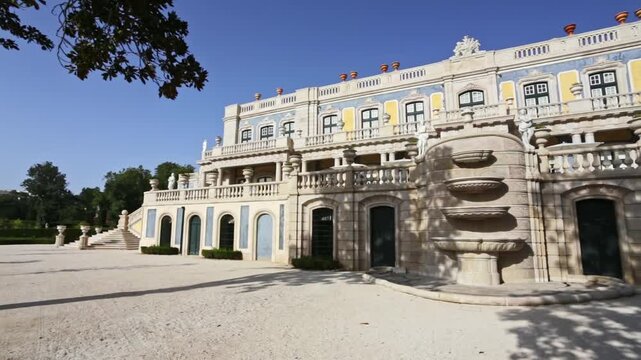 Majestic view of the robillon pavilion and the hanging gardens at the national palace of queluz, a renowned rococo landmark and significant example of portuguese architecture near lisbon