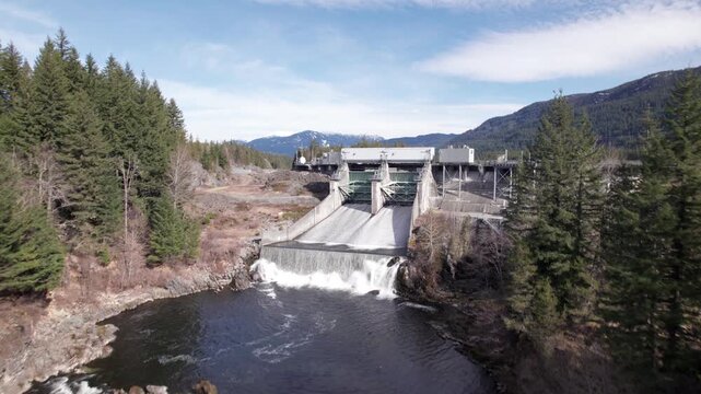 Aerial drone view of hydroelectric dam and reservoir in Whistler, British Columbia, Canada