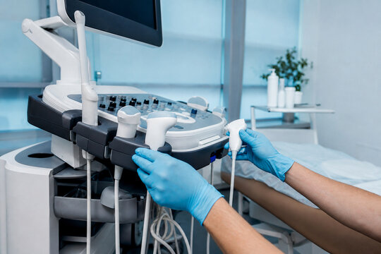 Technician in blue gloves organizing transducer probes in holders of ultrasound machine cart. Equipment preparation in hospital examination room. Generative AI.