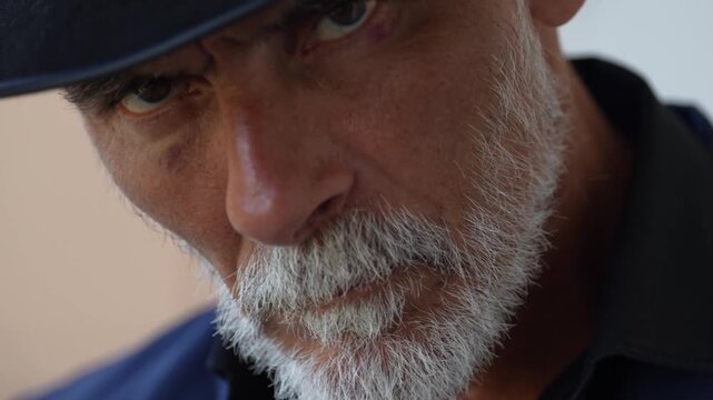 Cinematic portrait of a mature silver haired gentleman with beard and distinctive features, representing confidence, experience, authenticity and strong masculine character