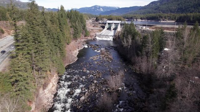 Aerial drone view of hydroelectric dam and reservoir in Whistler, British Columbia, Canada