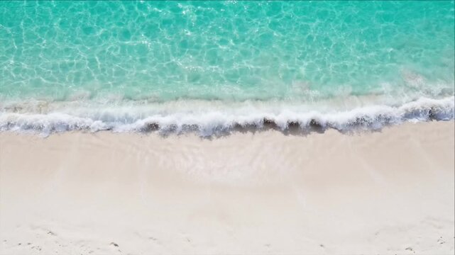 Turquoise ocean wave sandy beach luminous water texture aerial background serene shore nature vacation tropical wave shoreline summer seascape clear sea white sand relaxation scene