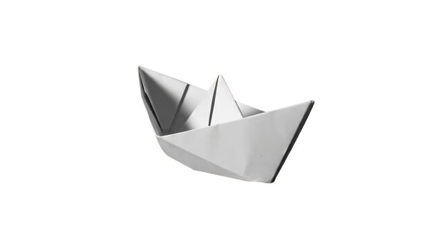 A classic folded white paper origami boat, isolated against a solid white background. Great for travel concepts, childhood nostalgia media, creative startup logos, dream journey graphics, and modern m