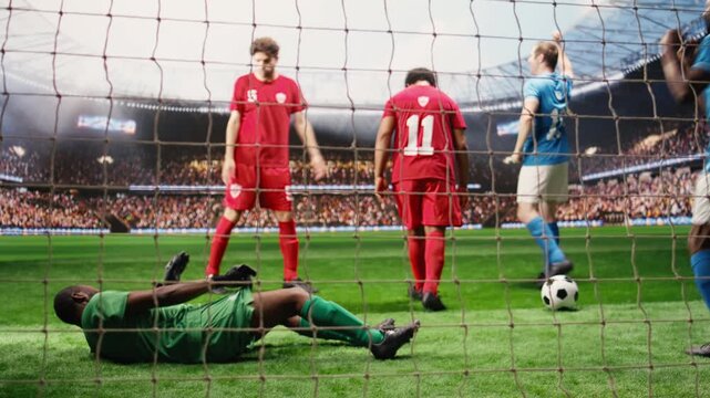 Selective focus of striker kicking ball in net for winning goal, shooting in front of goalkeeper during match action, for ball control and football attack.