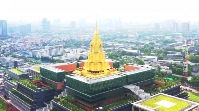 The New Parliament of Thailand showcases majestic golden stupa dominating Bangkok's skyline atop contemporary building complex featuring green roofs and dark facades, an iconic urban architectural sce