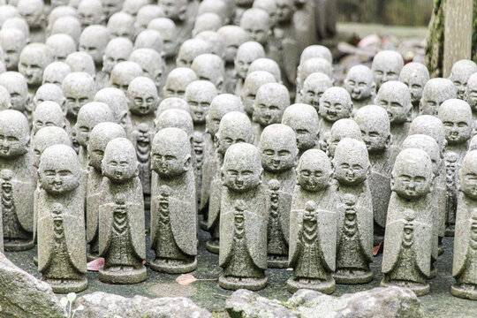 Rows of Small Stone Jizo Statues at a Japanese Temple