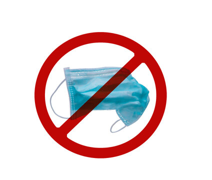 Used blue surgical face mask in red forbidden symbol on white background. No discard used medical face mask in this area. Medical waste management with hygienic rule in hospital and community.