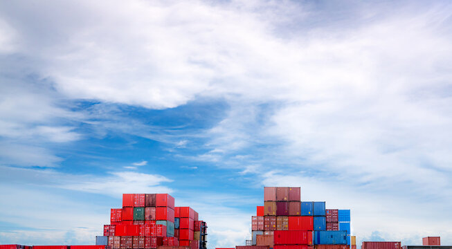 Container logistic. Cargo and shipping business. Container ship for import and export logistic. Container freight station. Logistic industry from port to port. Container at harbor for truck transport.