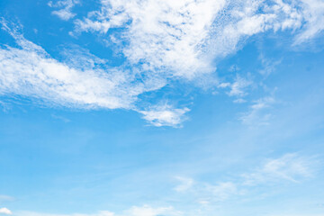 Fototapeta premium Beautiful blue sky and white clouds abstract background. Cloudscape background. Blue sky and fluffy white clouds on sunny day. Nature weather. Beautiful blue sky for happy day background. Summer sky.