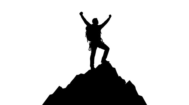 Silhouette of a successful hiker standing with arms raised on top of a mountain peak reaching a goal and celebrating achievement after a long trek in the outdoors