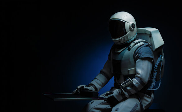 silhouette of a spacesuit on a dark background