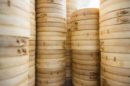 Many bamboo steamers stacked together